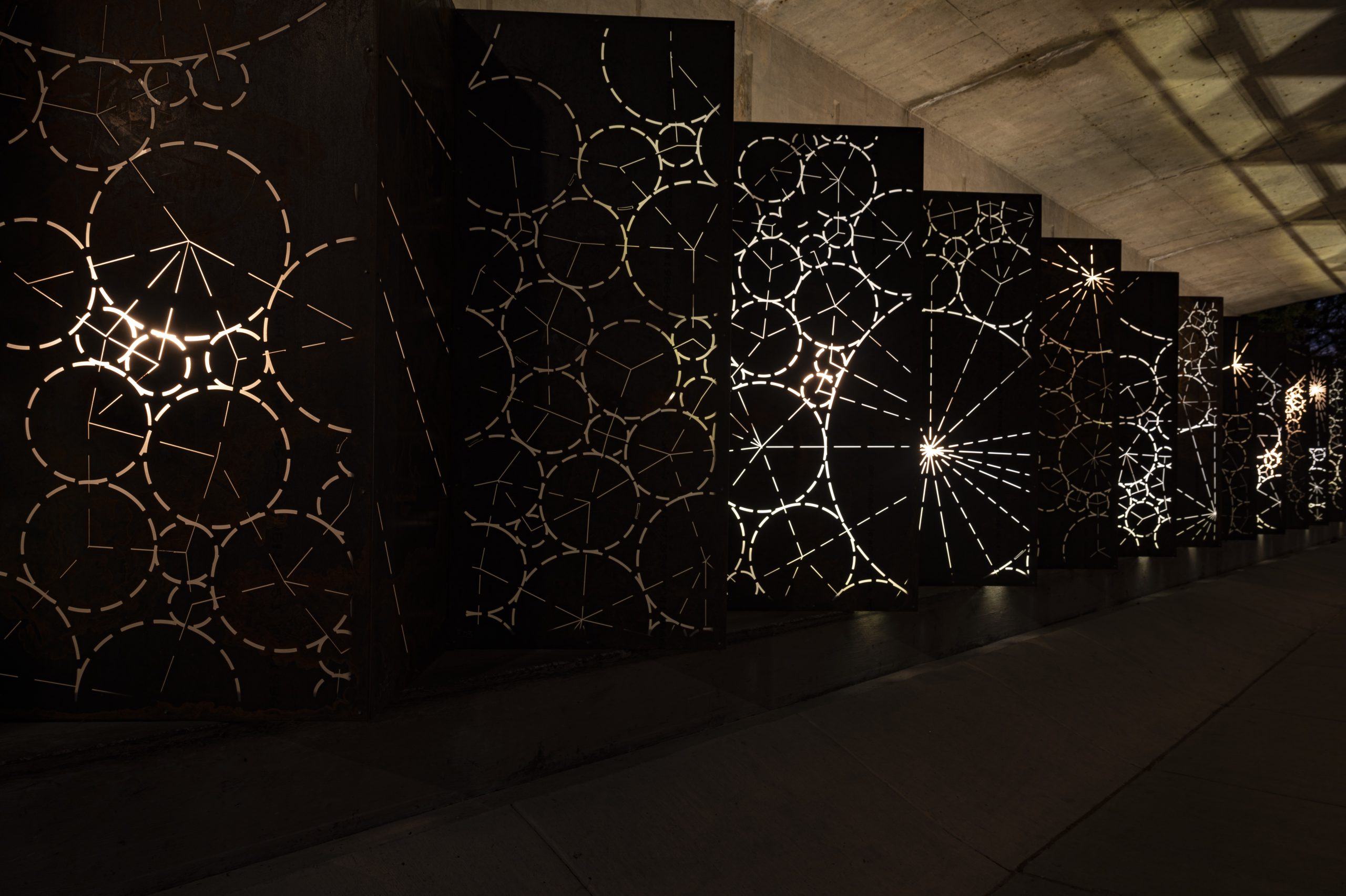 ‘Shift’ a public art installation comprised of two 70-foot metal light sculptures.